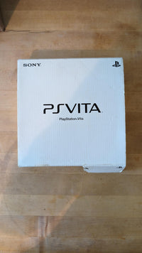 Sony Playstation Vita (White) w/ Sony 32gb Memory Card (S005)