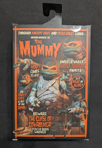 NECA TMNT X UNIVERSAL MONSTERS MICHELANGELO AS THE MUMMY NIB (TY001)